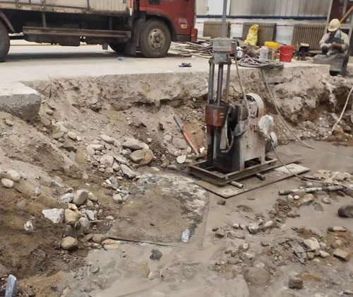 托喀依乡公路下沉压浆